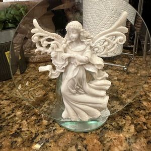 Candle holder with angel
